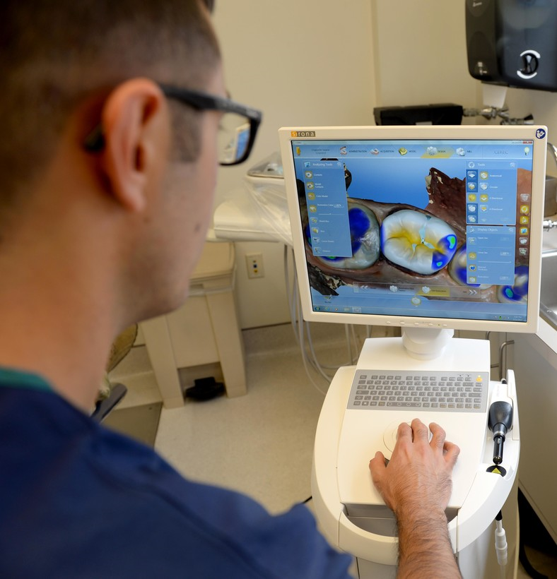 dentist looking at xrays