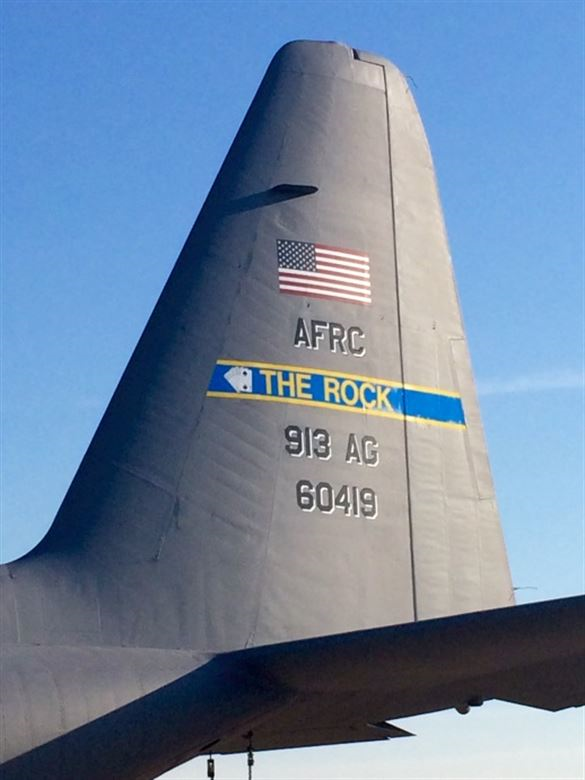 c130 tail with "The Rock" painted on it