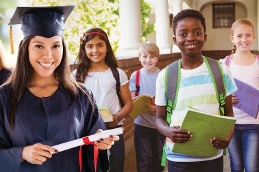 kids standing behind a graduate in her cap and gown