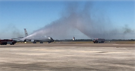 Pilot's last flight, fire trucks spraying water over the airplane