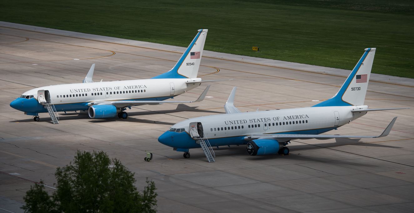 two aircraft sitting on the ramp
