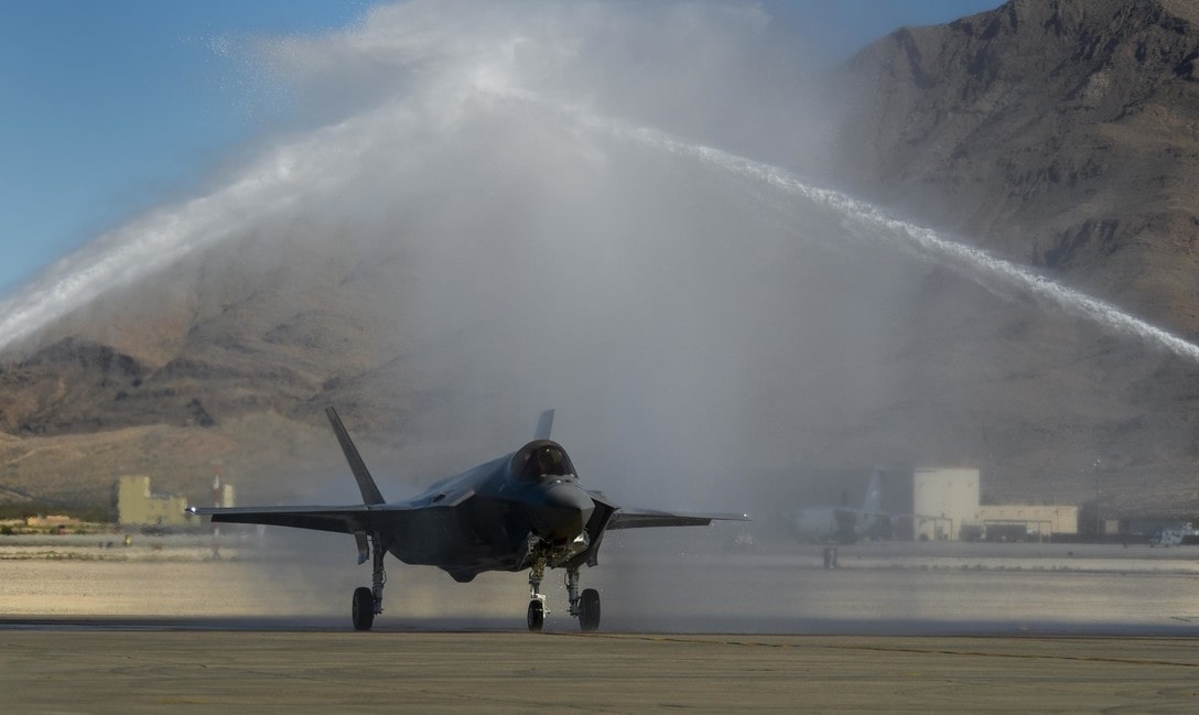 Pilots last flight, water spraying over the F35